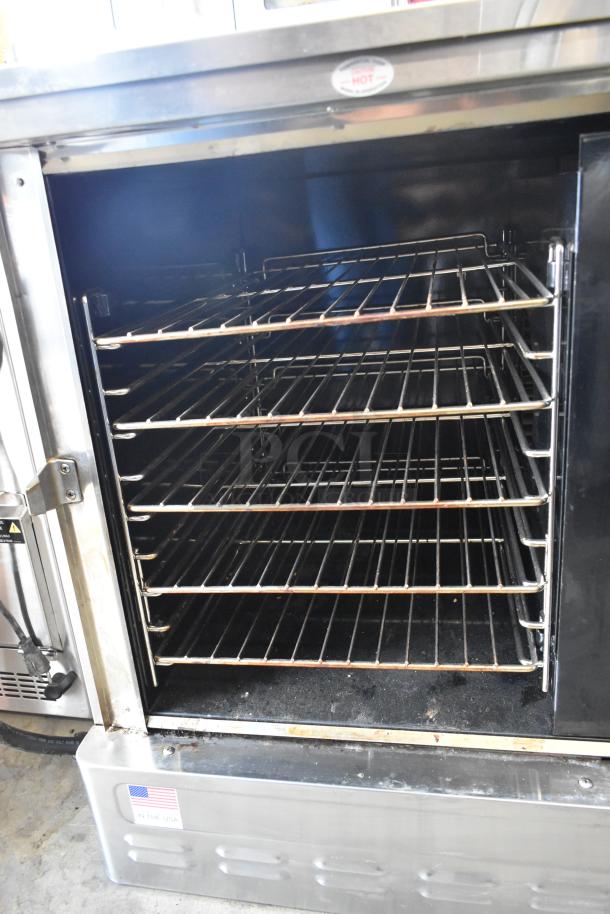 2023 Blodgett DFG-50 stainless steel half-size convection oven, natural gas, solid door, metal racks, thermostatic controls.