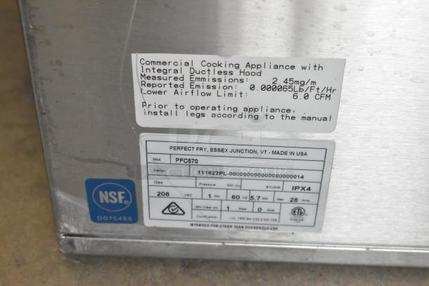 Perfect Fry Company PFC570 stainless steel ventless fryer, 208V, 1 phase. Labels show emissions, serial number, and NSF certification.