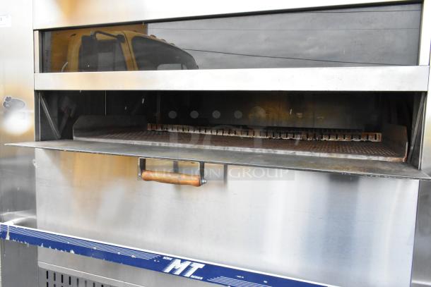 Picard MT-8-24 stainless steel propane gas revolving tray oven with hood, 180,000 BTU, commercial floor style.