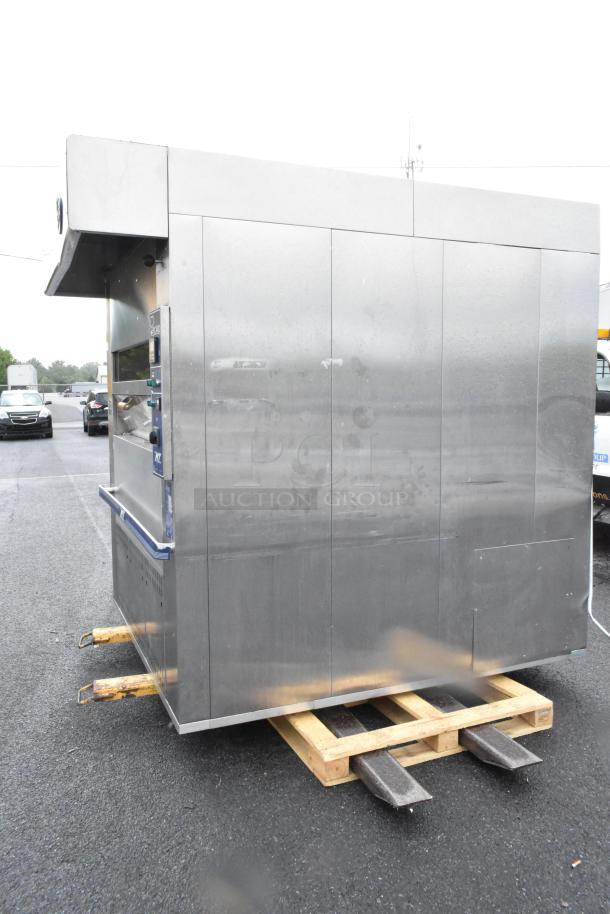 Picard MT-8-24 stainless steel propane gas pan revolving tray oven with hood, 180,000 BTU, commercial floor style.