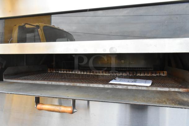 Picard MT-8-24 stainless steel propane pan revolving tray oven with hood, 180,000 BTU. Commercial use, good condition.