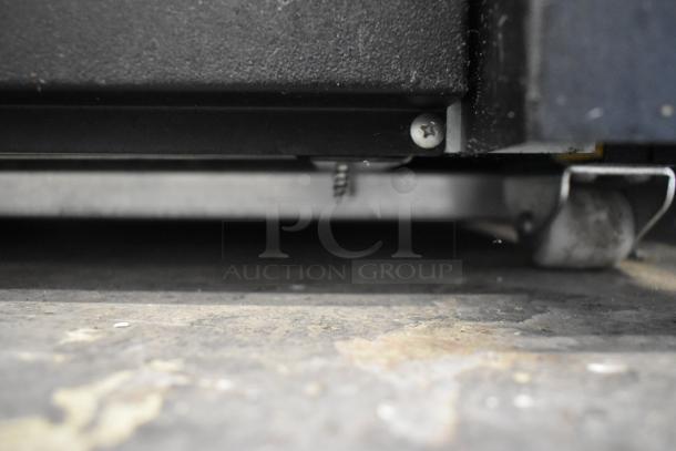 Avantco 189BVAC46HC metal commercial merchandiser base with four screws, part of a floor-style grab-n-go unit.