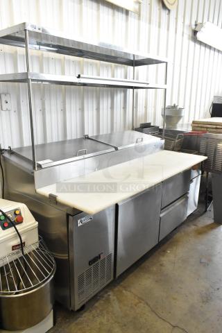 2024 Avantco 178SSPPT2 Stainless Steel commercial Pizza Prep Table w/ Oversized Cutting Board, 2 Tier Over Shelf, 2 Drawers and Door on Commercial Casters. 115 Volts, 1 Phase. - Item #1199647