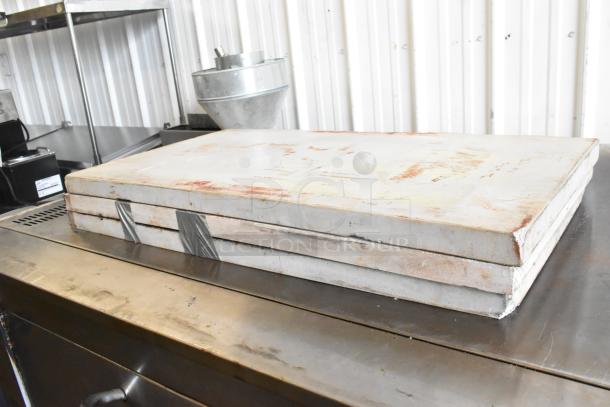 Bakers Pride EP8-5736 pizza oven with cooking stones, stainless steel, on metal legs. Shows wear, 208V, 3 Phase.