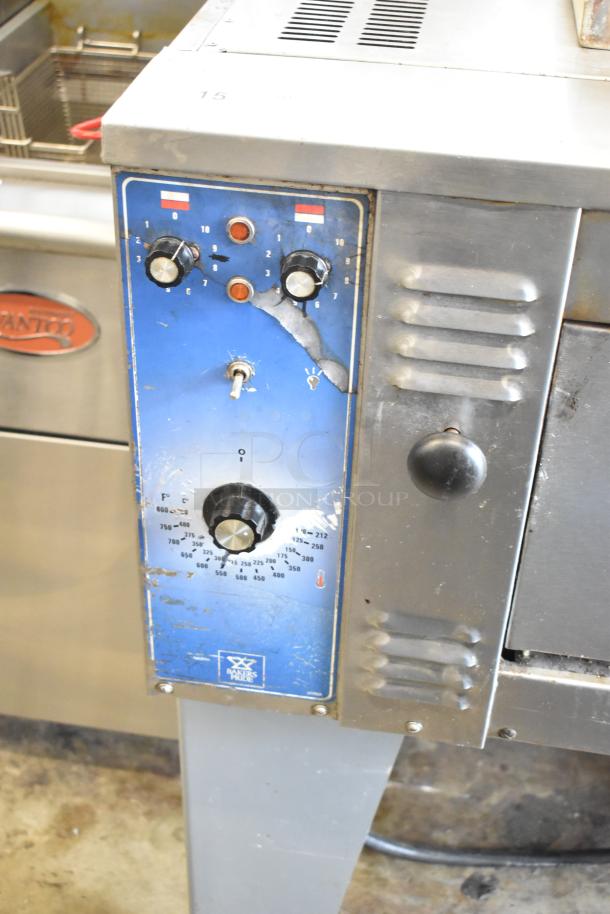 Bakers Pride EP8-5736 stainless steel commercial electric pizza oven with cooking stones, 208V, 3 phase, visible control panel.