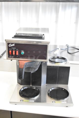Curtis CAFE3DB10A000 3 burner stainless steel countertop range with poly brew basket; 120V, 1 phase; excellent condition.