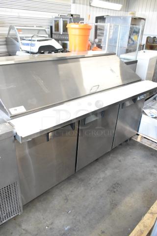 BRAND NEW Avantco 178APT71MHC stainless steel sandwich salad prep table, 115V, with commercial casters, minor dents.