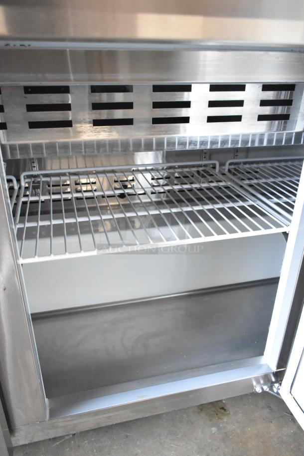 Brand new Avantco 178APT71MHC stainless steel sandwich prep table. Features mega top, bain marie, commercial casters. 115V.
