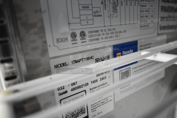 Alt text: Close-up of labeling on Avantco 178APT71MHC stainless steel prep table. Includes model and certification details.