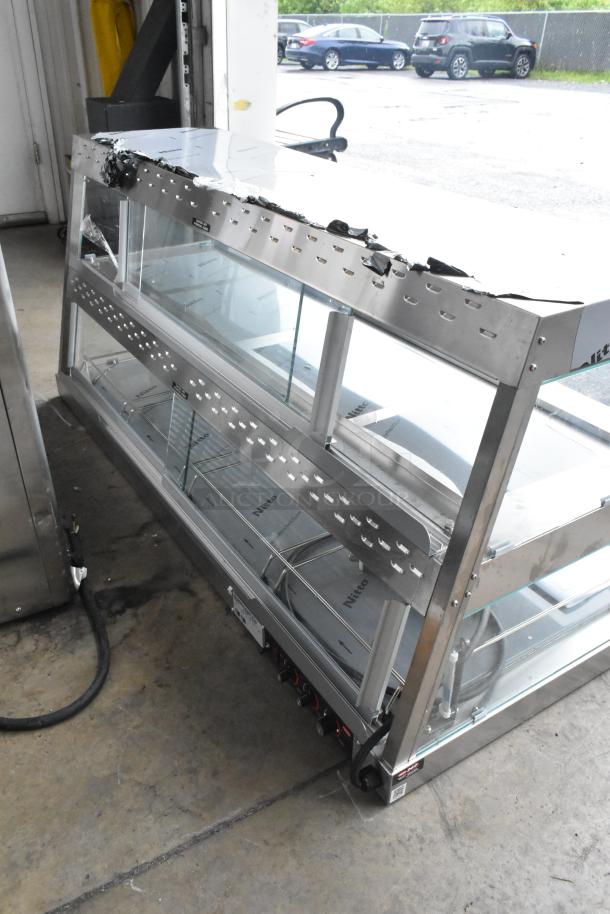 Hatco GRHD-4PD Stainless Steel Glo-Ray Dual Shelf Merchandiser, new scratch and dent, 58.5" wide, 120/208V, 1 phase.