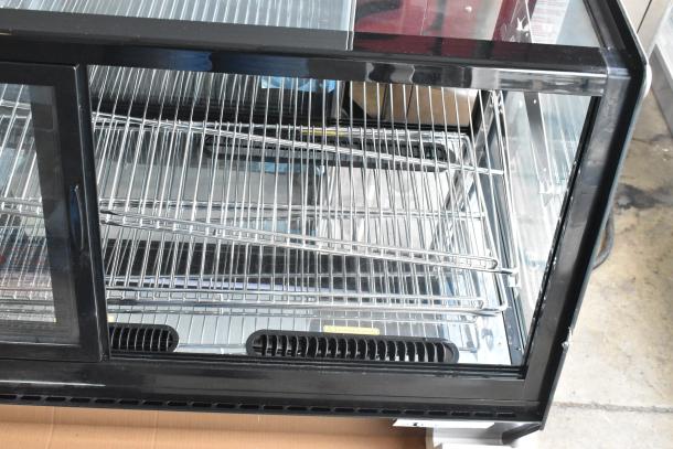 Brand new Avantco 360BCSS48HCB 48" black refrigerated bakery display case, LED lighting, scratch and dent condition.
