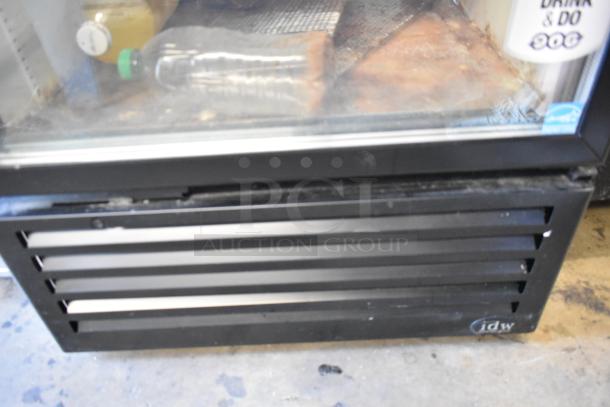 2020 IDW G-26-C-3-3-4-B-5 Cooler; metal, single door, reach-in merchandiser with poly coated racks, model logo visible.