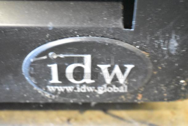 IDW logo on metal surface of 2020 IDW G-26-C-3-3-4-B-5 Single Door Reach In Cooler. Label includes URL "www.idw.global".