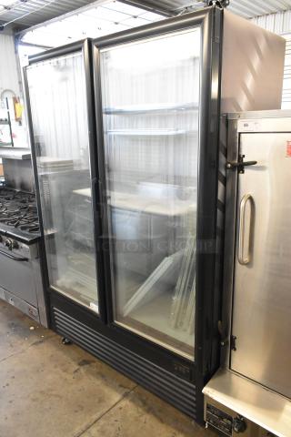 Akita AGF-43-NY metal 2-door reach-in cooler, poly-coated racks, commercial casters, 115V, 1 phase, excellent condition.