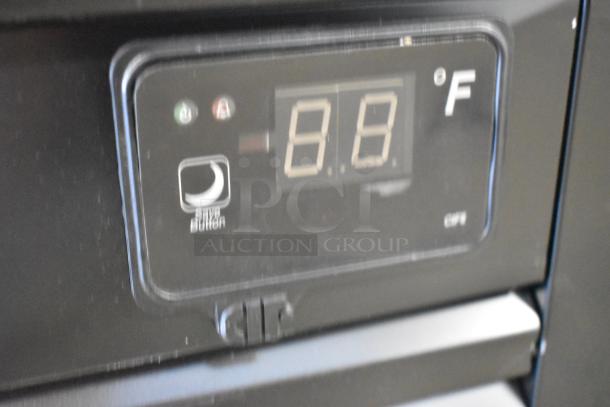 Control panel of Akita AGF-43-NY 2 Door Reach In Cooler, showing temperature settings. Digital display reads "8.8°F".
