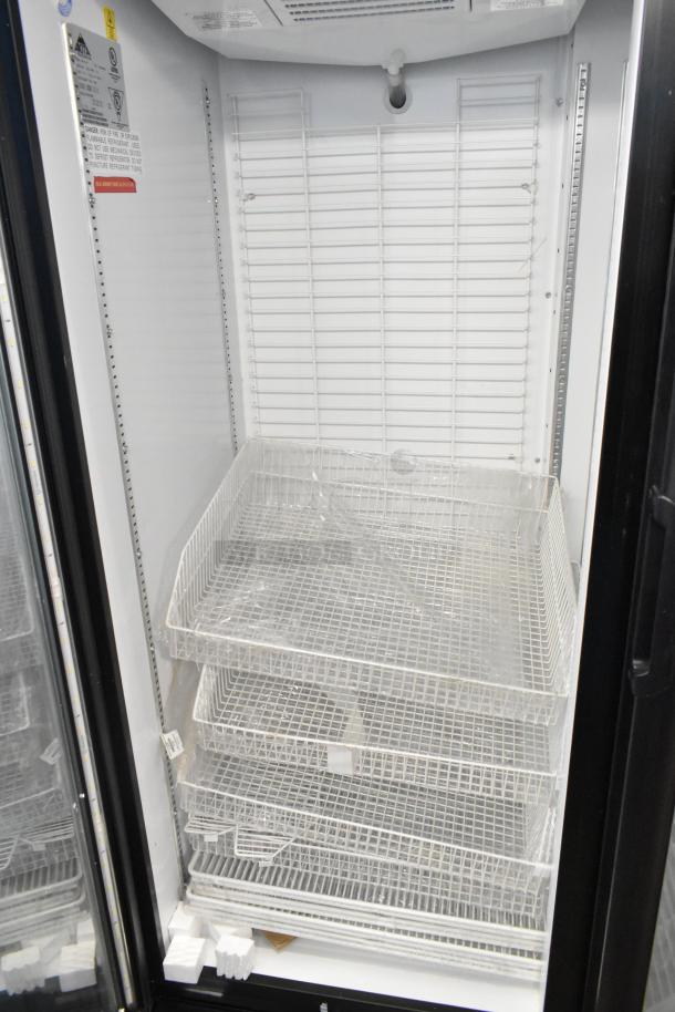 Akita AGF-43-NY metal commercial 2-door reach-in cooler, poly coated racks, commercial casters, 115V, 1 phase, clean interior.