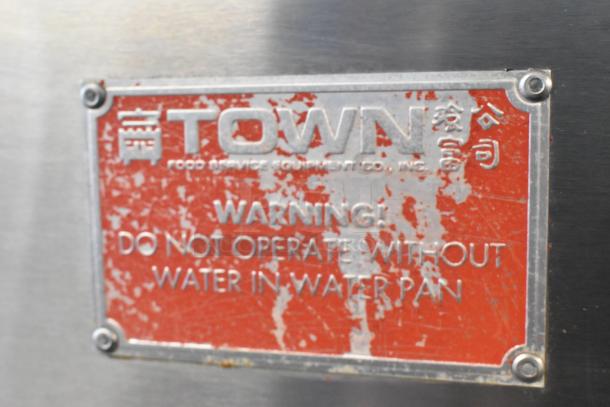 Town SM-24-R-SS-P stainless steel commercial propane Chinese smoker. Visible warning label: "Do not operate without water in water pan."