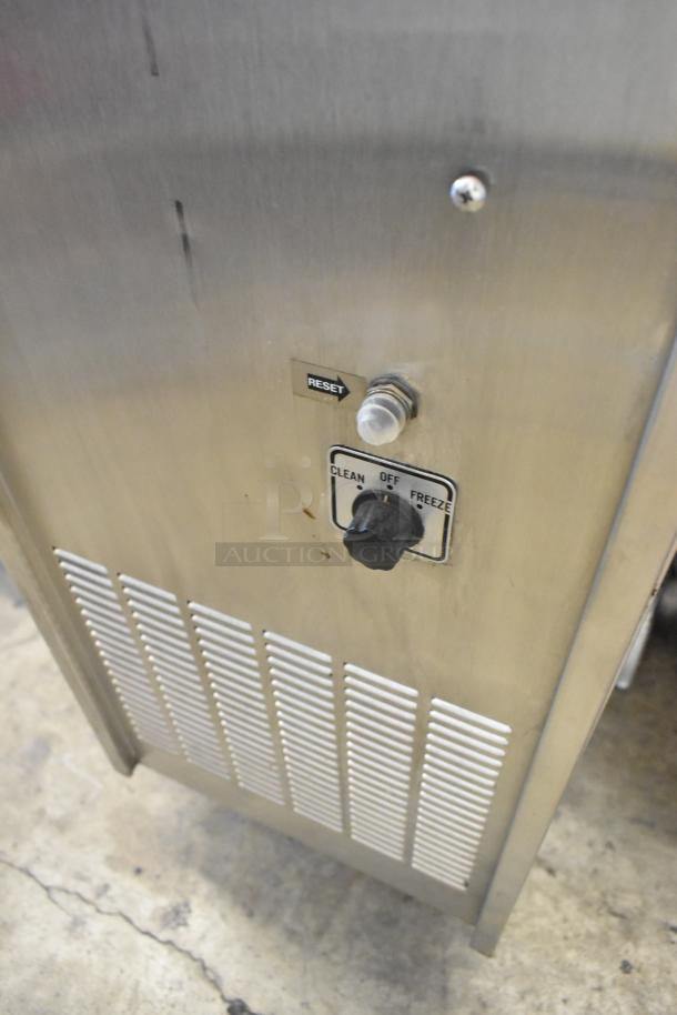 Duke Electro Freeze 145-214 slushie machine, stainless steel, commercial casters, clean/off/freeze switch, reset button.
