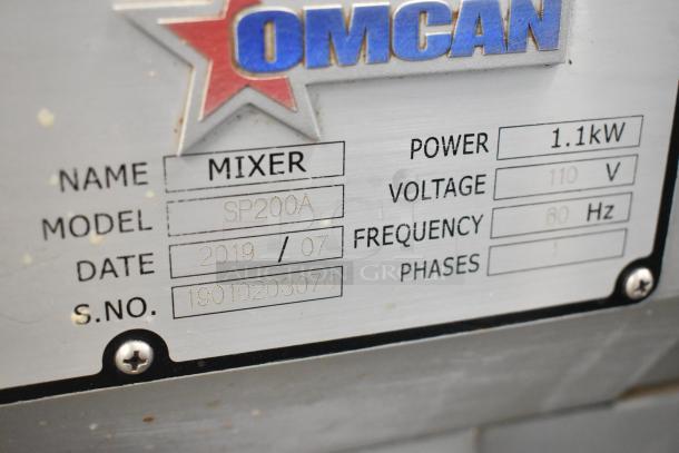 2019 Omcan SP200A mixer label showing model, date, power, voltage, and serial number.