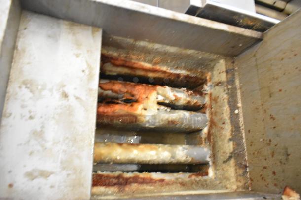Hurakan HKN-FXF40A/US deep fat fryer, stainless steel, gas powered, 90,000 BTU, commercial use; visible wear.