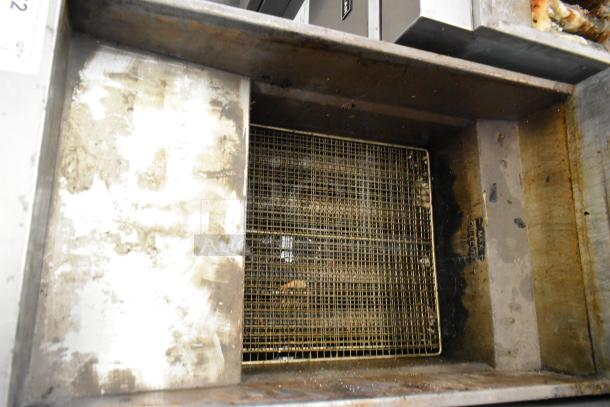 Pitco Frialator SG14 stainless steel commercial deep fryer in used condition, natural gas, 110,000 BTU, interior view.