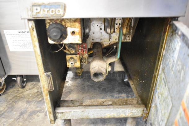 Pitco Frialator SG14 stainless steel floor-style natural gas deep fat fryer, 110,000 BTU, visible signs of use and wear.