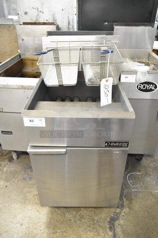 Dukers DCF5-NG stainless steel deep fat fryer, 150,000 BTU, with 2 metal fry baskets on commercial casters.
