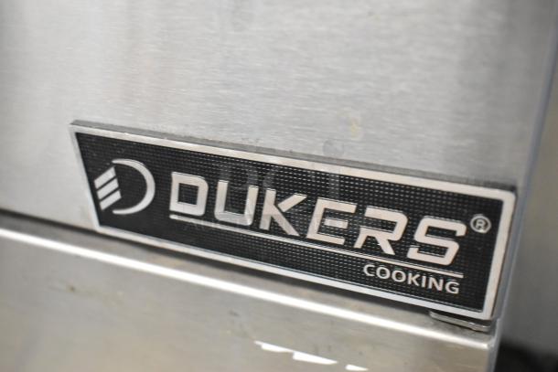 Dukers DCF5-NG stainless steel commercial deep fryer, natural gas powered, with logo tag.