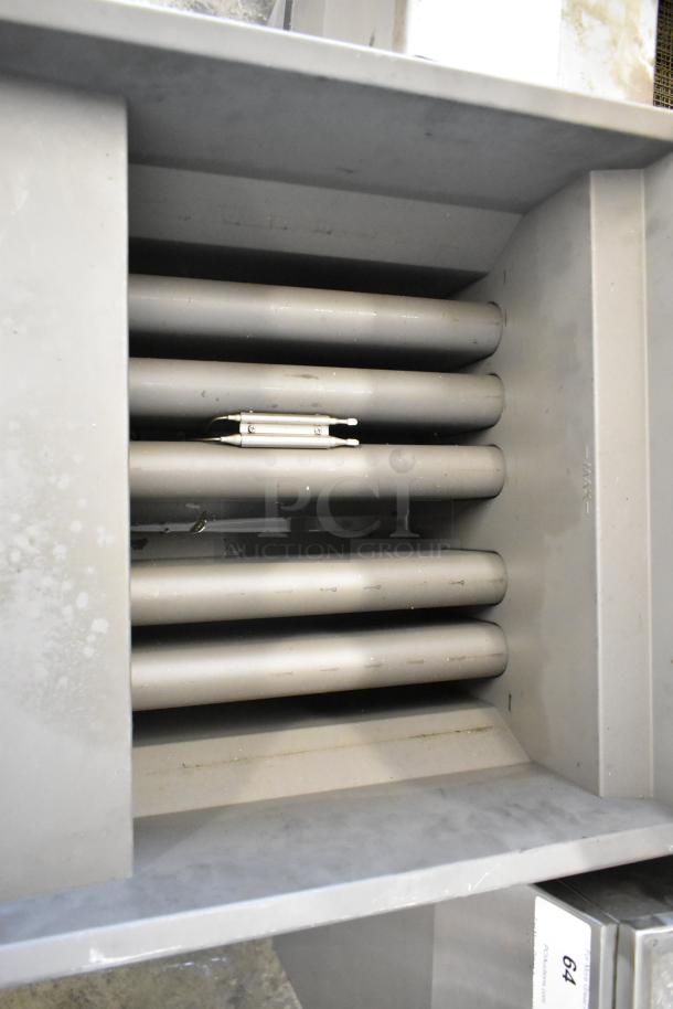 Dukers DCF5-NG stainless steel deep fat fryer with 2 metal fry baskets, natural gas powered, 150,000 BTU, on casters.