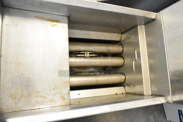 Royal REEF-35 stainless steel deep fryer, shows interior heating elements, commercial casters, used condition.