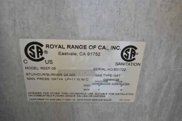Royal REEF-35 stainless steel deep fryer, natural gas, with 2 fry baskets, on casters. Serial #831722. BTU: 24,000.