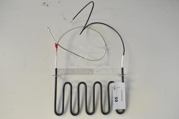 Brand new burner with minor scratches, unopened condition. Features coiled design and attached wires, labeled as lot 65.