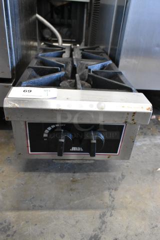 Toastmaster Stainless Steel 2 Burner Gas Range, commercial countertop model. Features control knobs and visible wear.