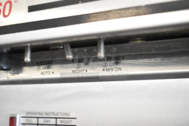 Electro Freeze 88TN-CMT-132 soft serve machine controls; stainless steel finish; shows clean, day, prime settings.