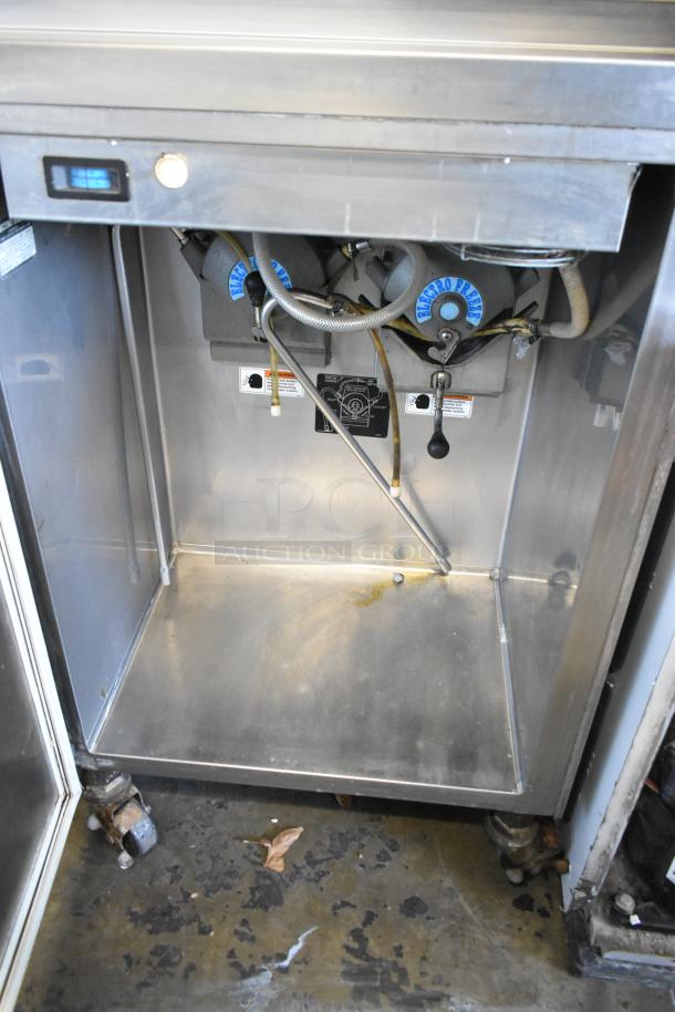 Electro Freeze 88TN-CMT-132, stainless steel soft serve machine; 2 flavors with twist; commercial casters; 208-230V, 3 phase.