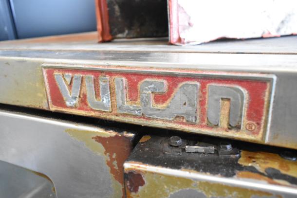 Vulcan SG1010T stainless steel commercial convection oven, natural gas, 70,000 BTU, view-through doors, metal racks.