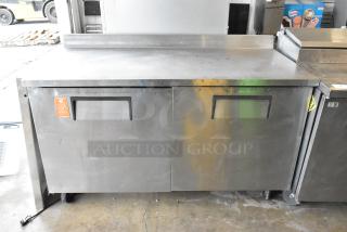 True TWT-60F stainless steel 2-door worktop freezer on casters, 115V, 1 phase, good condition, commercial-grade.
