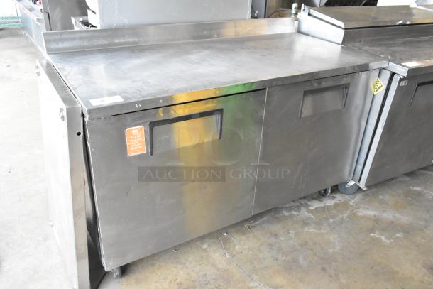 True TWT-60F stainless steel 2-door work top freezer on casters, 115 volts, 1 phase, in used condition.