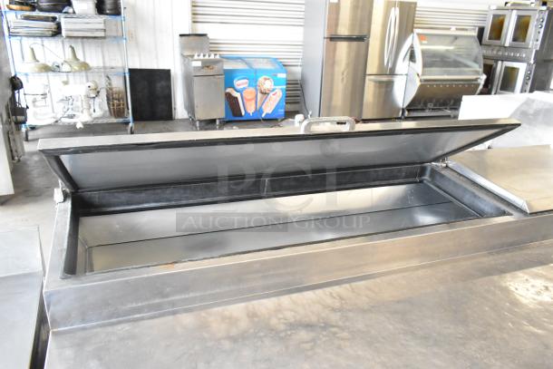 2017 True TPP-67 stainless steel pizza prep table with open top view, on commercial casters, 115V, 1 phase.