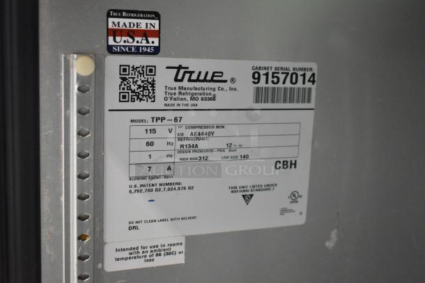 2017 True TPP-67 stainless steel commercial pizza prep table label; 115 volts, 1 phase, model and serial numbers visible.