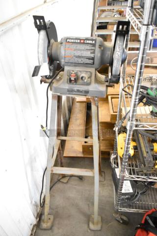 Porter Cable PCB575BG bench grinder on metal stand, 120 volts, 1 phase, good condition, visible control panel.