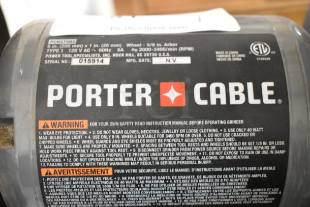 Porter Cable PCB575BG Bench Grinder, 120V, 1 Phase, with safety instructions. Model and serial number visible.