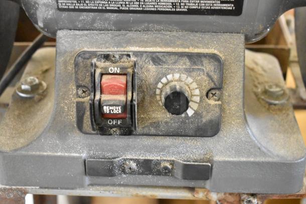Porter Cable PCB575BG Bench Grinder, 120V, 1 Phase, showing power switch and adjustment dial, used condition.