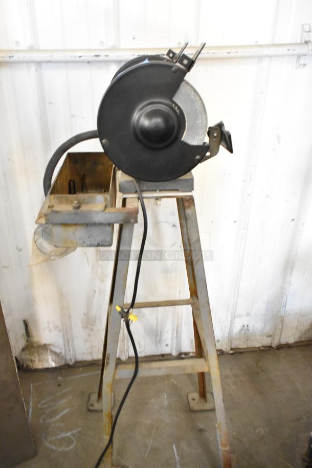 Porter Cable PCB575BG bench grinder on stand, 120 volts, showing moderate wear. Includes wiring and tool holder.
