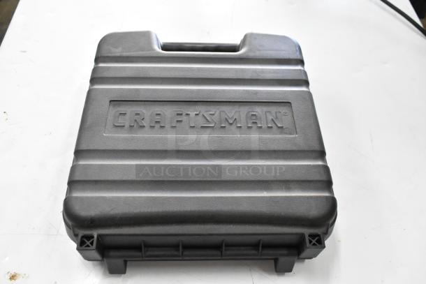 Craftsman power drill driver in black carrying case, embossed with Craftsman logo. Durable, portable tool set.