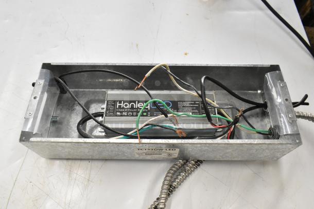 Westrim TC15TOW-LED power supply box, used condition, with exposed wiring and label indicating specifications.