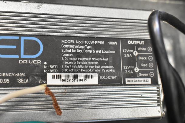 Close-up of Westrim TC15TOW-LED power supply box label, showing model H100W-PPS5 specs and caution details.