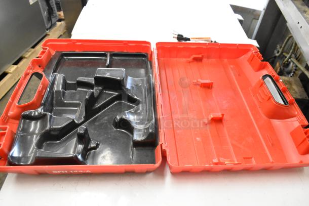 Open Hilti red tool box for SFH144-A drill, in good condition. Molded interior for drill storage.