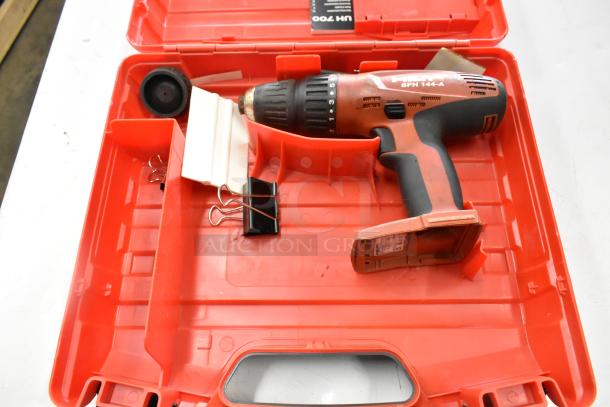 Hilti SFH144-A drill in red tool box with accessories; visible labels show model details; used condition.
