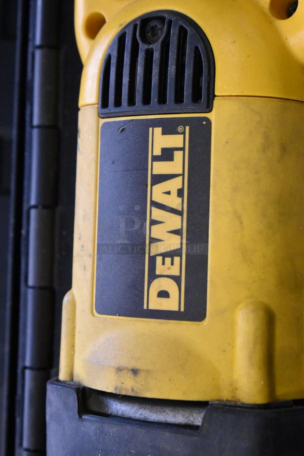 DeWalt DW304P Reciprocating Saw showing the brand logo, used condition, part of a lot with Hilti, Bosch, and Skil tools.